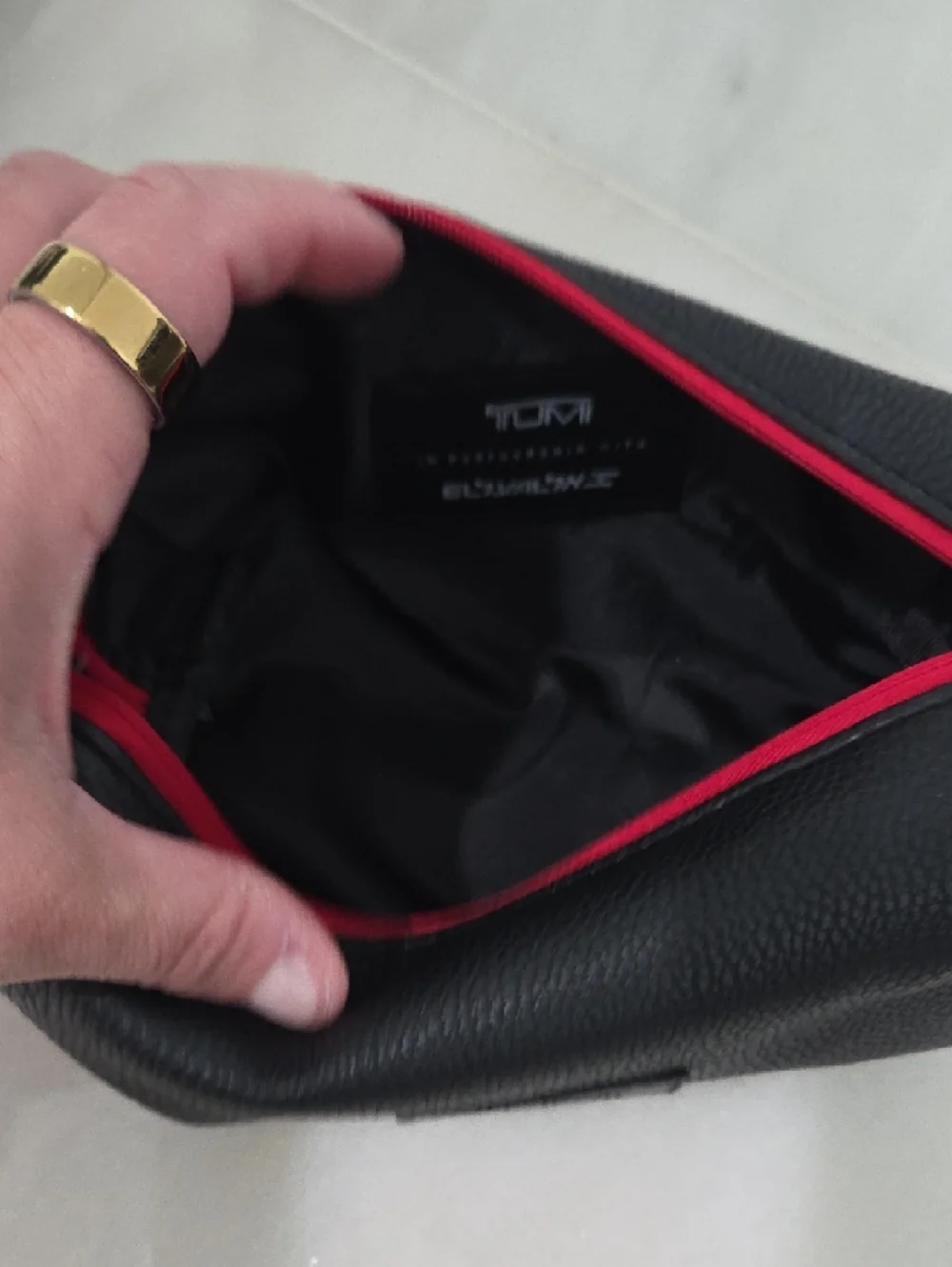 Tumi Black Toiletry Kit with Red Zipper Accent. New Never Used!